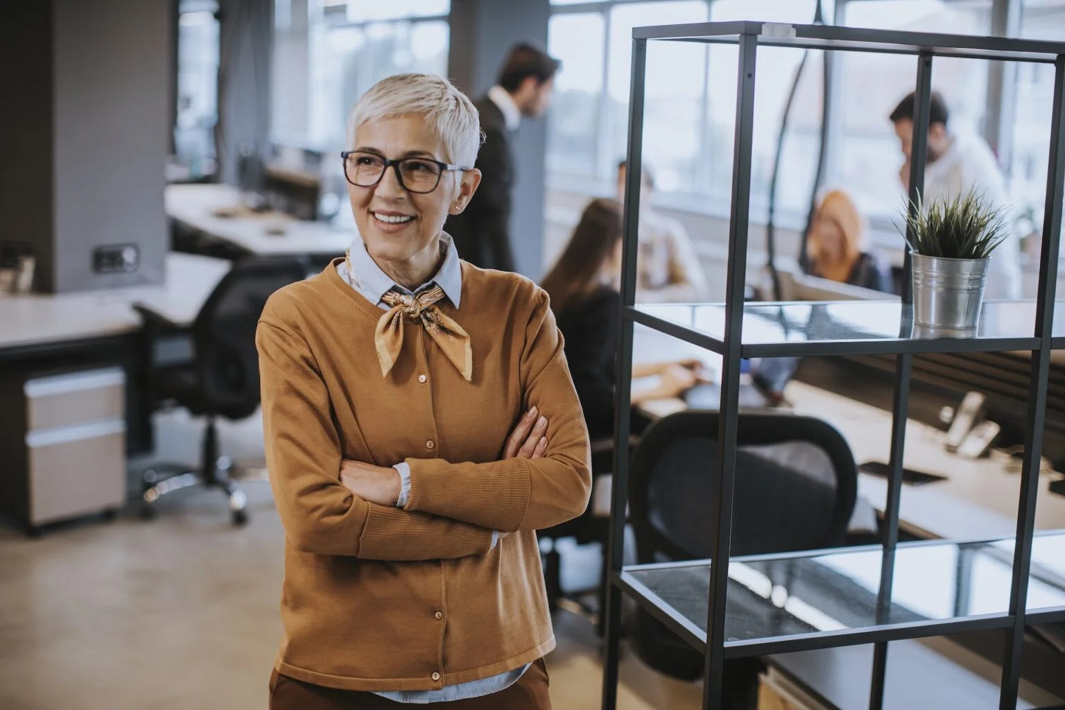 senior-businesswoman-standing-in-office-2026-01-08-06-05-40-utc-1536x1024